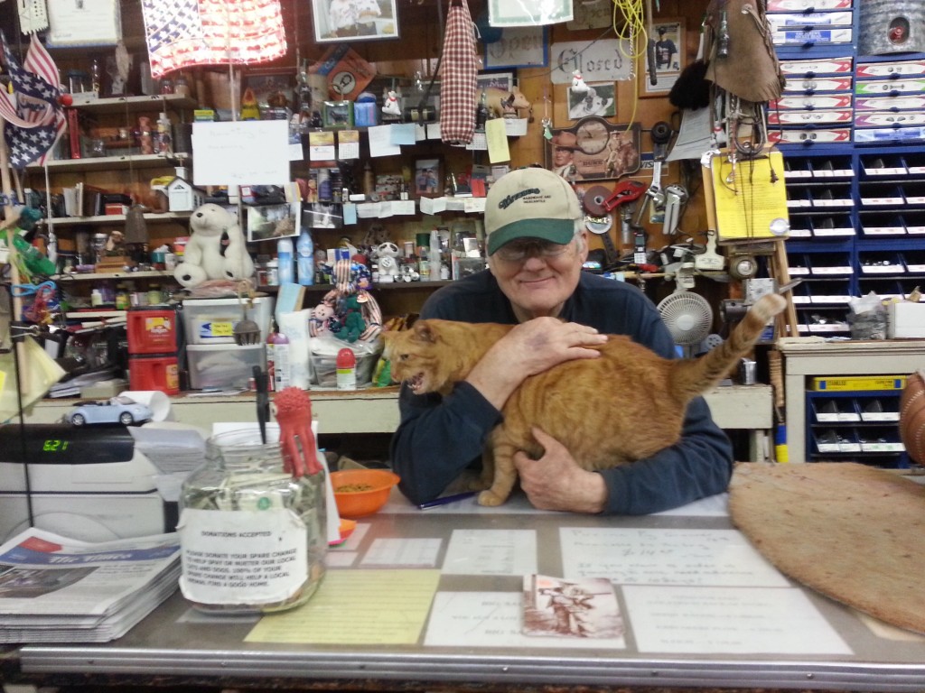 John and his monster cat Cougar, owner of Waitsburg Mercantile
