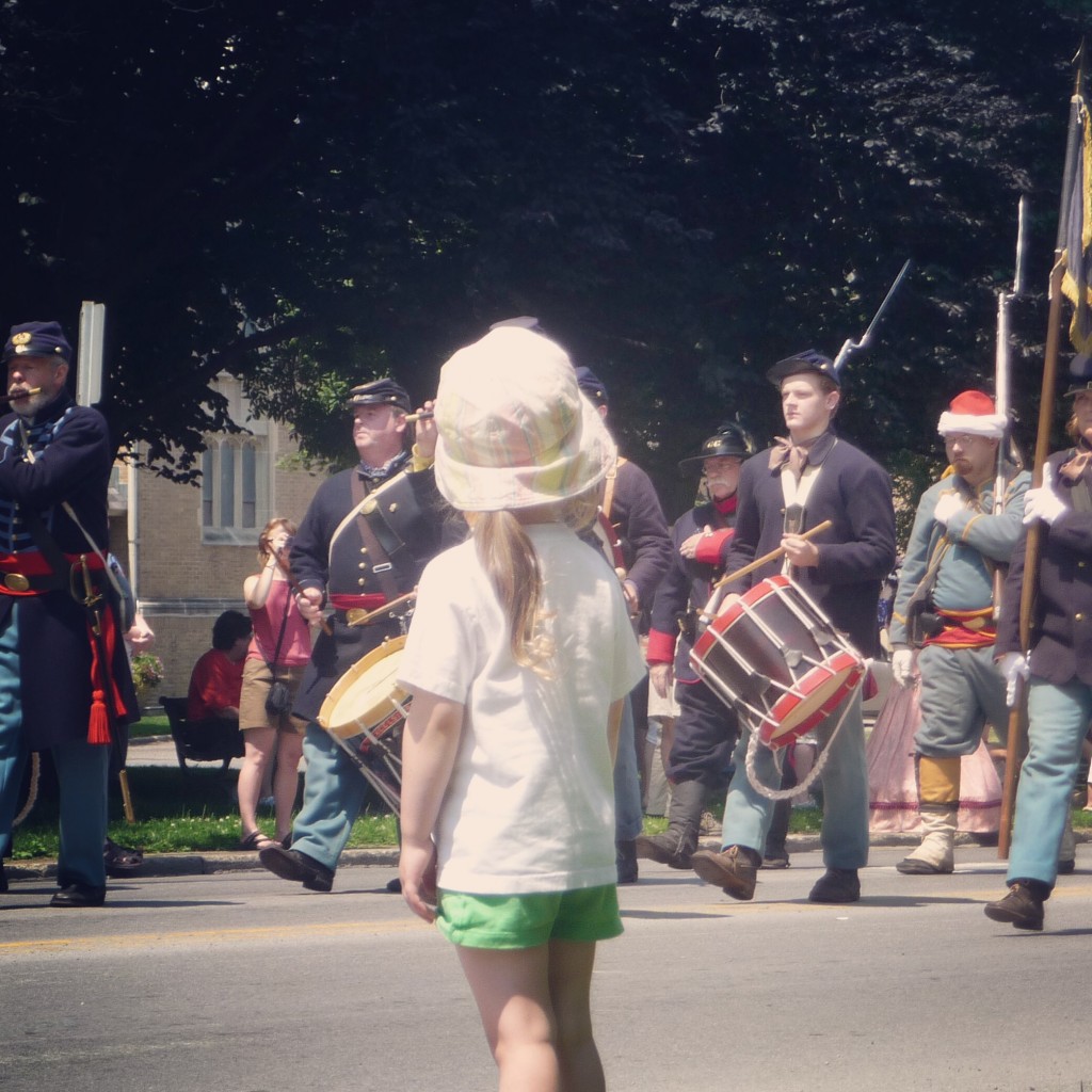 Girl watches civil war parade